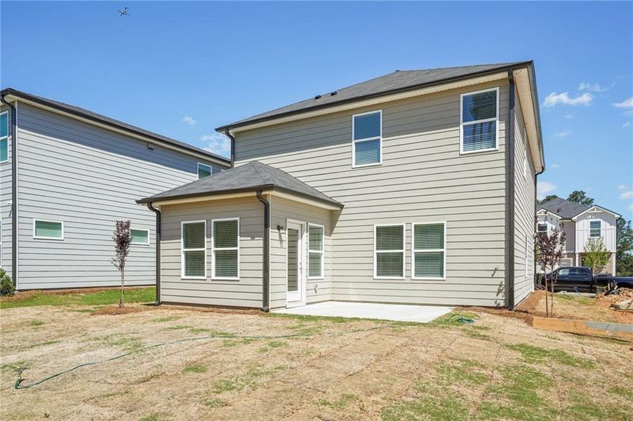 Exterior details and patio area of a home in Hawthorne Station, College Park (Image 24).