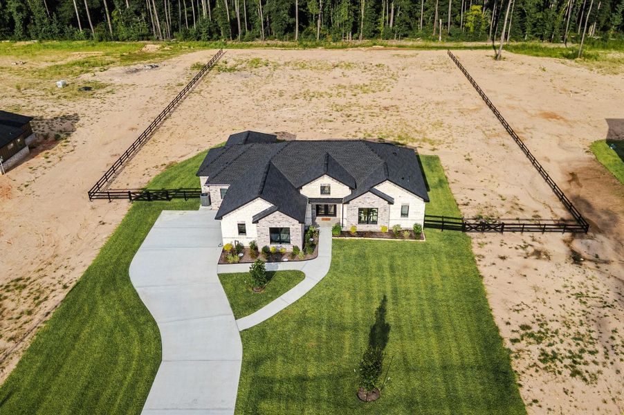 Welcome to The Abigail — a stunning single-story custom home nestled on a 1.5-acre lot, surrounded by tall pines for ultimate privacy and curb appeal. Welcome to The Abigail — a stunning single-story custom home nestled on a 1.5-acre lot, surrounded by tall pines for ultimate privacy and curb appeal.