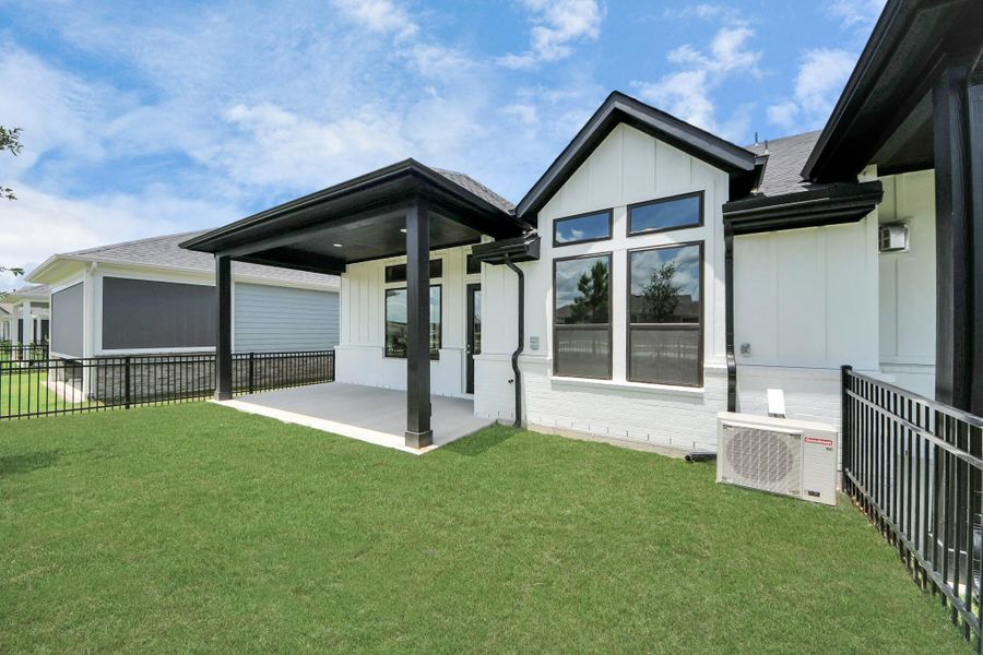 Front exterior of a new home in Gatherings® at Chambers Creek: Duets Collection, Willis, TX, highlighting curb appeal (Image 2). Front exterior of a new home in Gatherings® at Chambers Creek: Duets Collection, Willis, TX, highlighting curb appeal (Image 2).