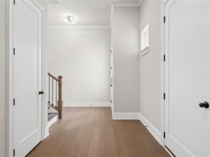 Spacious, unfurnished interior of a new home in The Village at Towne Lake, Woodstock (Image 38).