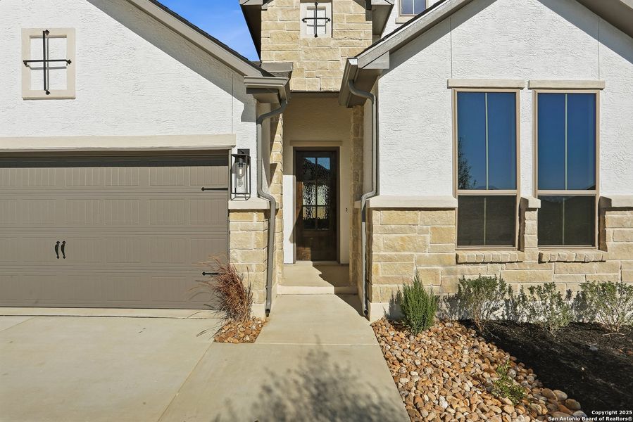 Exterior details and patio area of a home in Legacy at Lake Dunlap, New Braunfels (Image 4). Exterior details and patio area of a home in Legacy at Lake Dunlap, New Braunfels (Image 4).