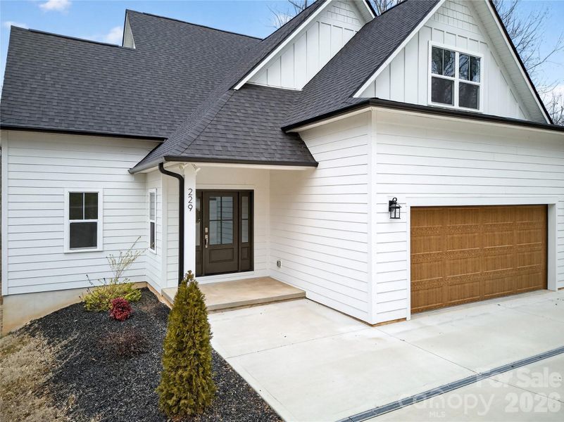 Exterior details and patio area of a home in , Troutman (Image 22).