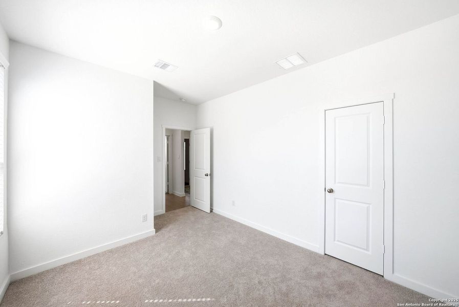 Spacious, unfurnished interior of a new home in Hidden Trails: Coastline Collection, Bulverde (Image 21).