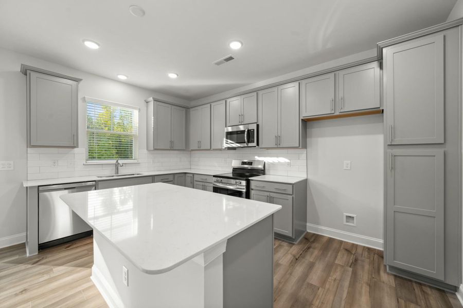 Furnished interior view inside a new home in Cottages at Piper Village, Trinity (Image 7).