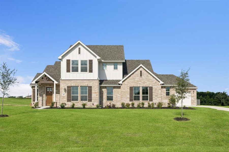 Craftsman-style house featuring board and batten siding, a shingled roof, a front lawn, and brick siding Craftsman-style house featuring board and batten siding, a shingled roof, a front lawn, and brick siding