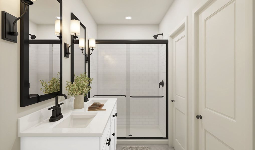 Matte black glass shower enclosure in primary bath
