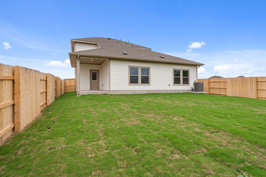 Rear of Home and Private Backyard