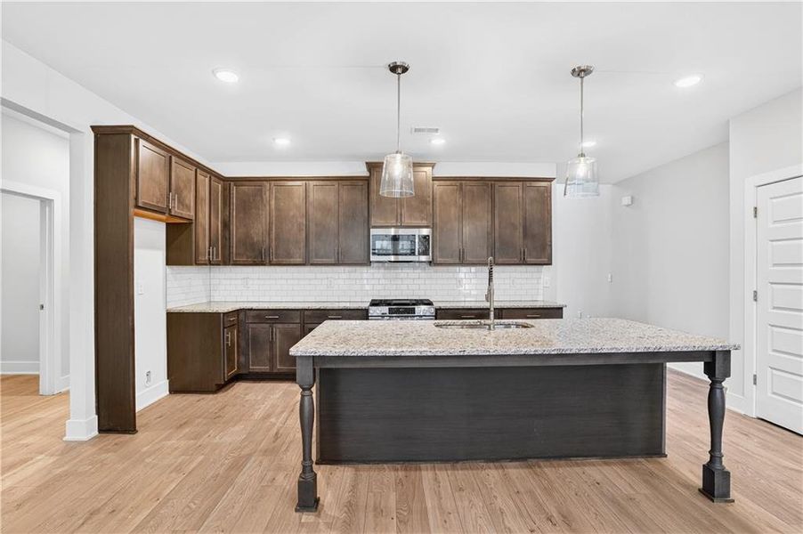 Furnished interior view inside a new home in The Fairways at Mirror Lake, Villa Rica (Image 10).