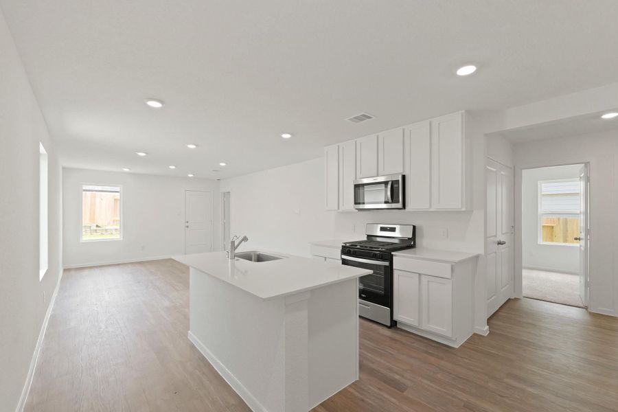 Furnished interior view inside a new home in The Canopies, Splendora (Image 5).