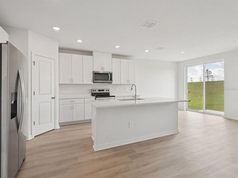 Furnished interior view inside a new home in Salt Meadows - Classic Series, Parrish (Image 7).