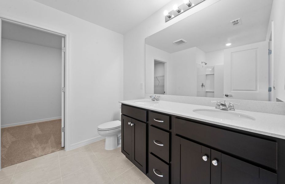 Furnished interior view inside a new home in Whispering Lakes, Lehigh Acres (Image 6).