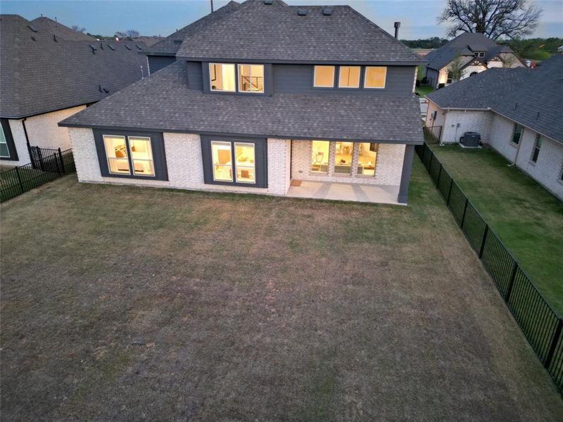 Exterior details and patio area of a home in Abe's Landing, Granbury (Image 4).