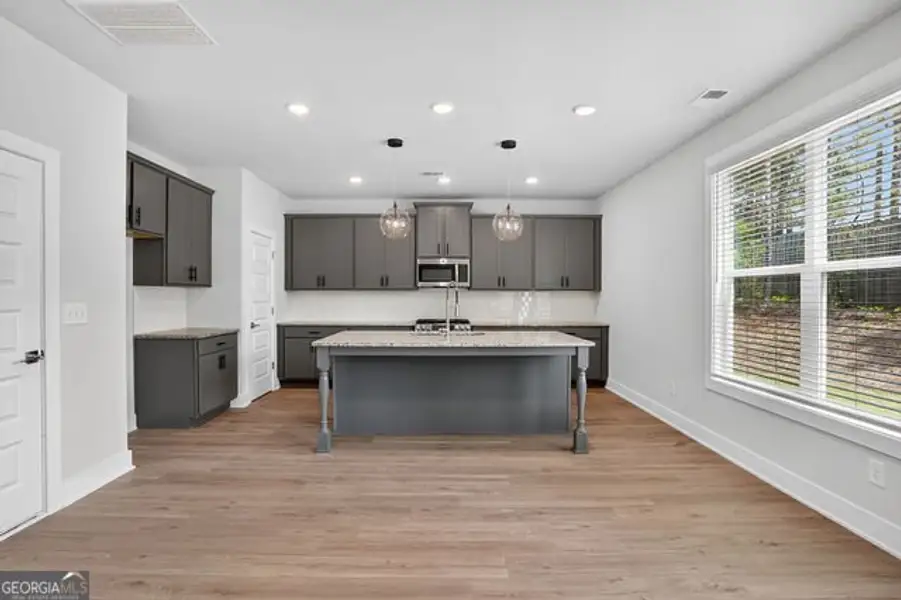 Furnished interior view inside a new home in Killian Manor at The Adares, Adairsville (Image 5).