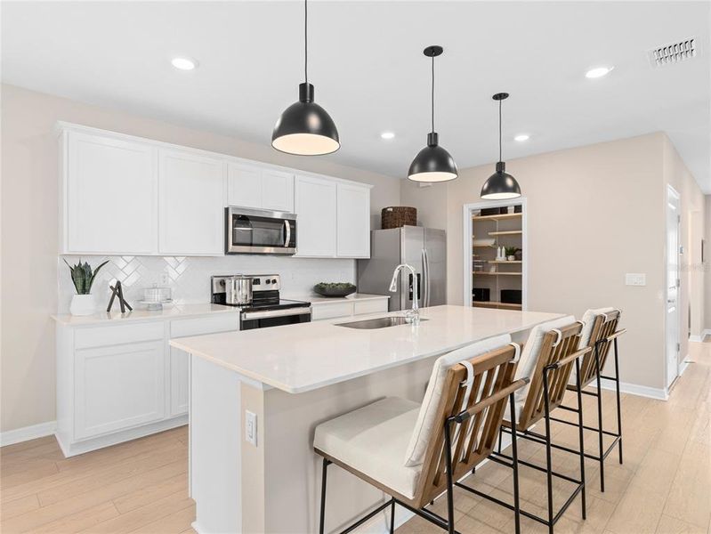 Furnished interior view inside a new home in EverBe, Orlando (Image 7).
