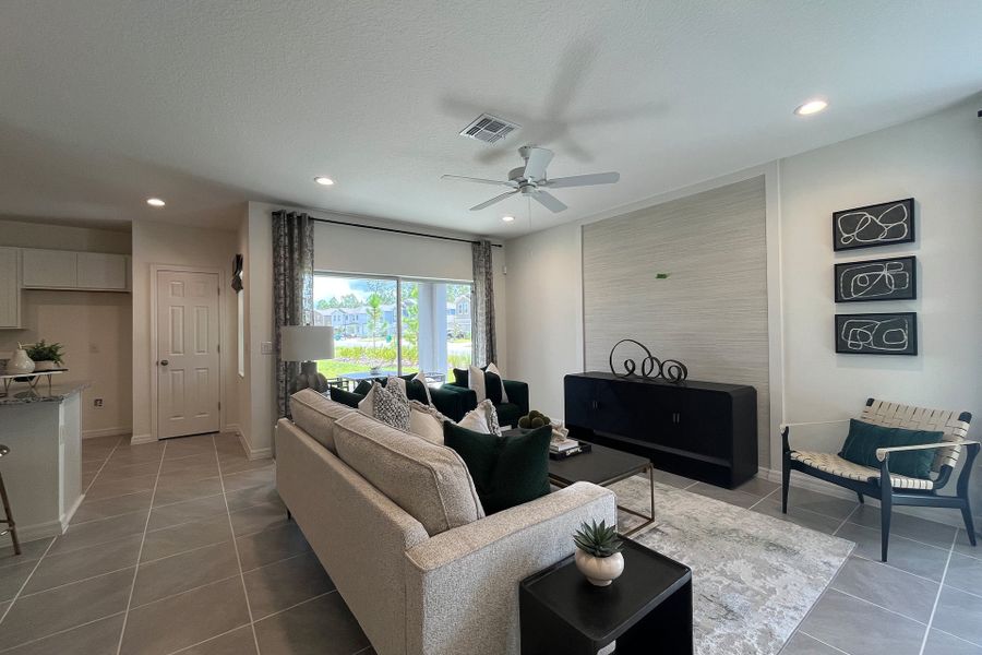 Ashley townhome model in Pine Meadows, Eustis FL — elegant two-story home with 4 bedrooms, 3 baths, and 1,898 sq. ft. of living space. Featuring an open-concept kitchen, dining, and living area, this modern townhome offers flexible layouts for families, guests, or a home office. Highlights include a spacious primary suite with private bath, second-floor laundry, covered lanai, and welcoming entry porch. Built with energy efficiency and stylish design, the Ashley townhome blends comfort, functionality, and charm in a sought-after Central Florida community.