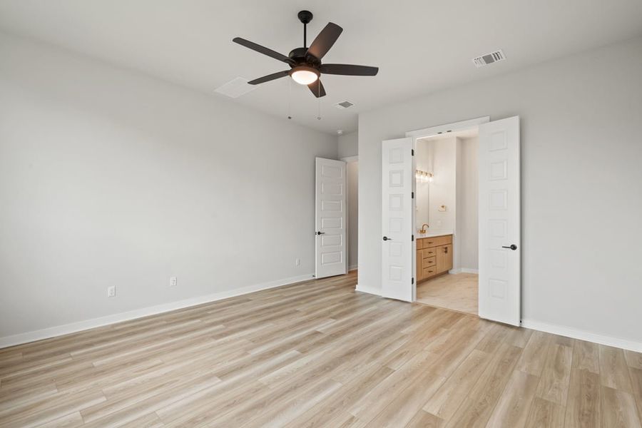 Spacious, unfurnished interior of a new home in Arbor Collection at Lariat, Liberty Hill (Image 37). Spacious, unfurnished interior of a new home in Arbor Collection at Lariat, Liberty Hill (Image 37).