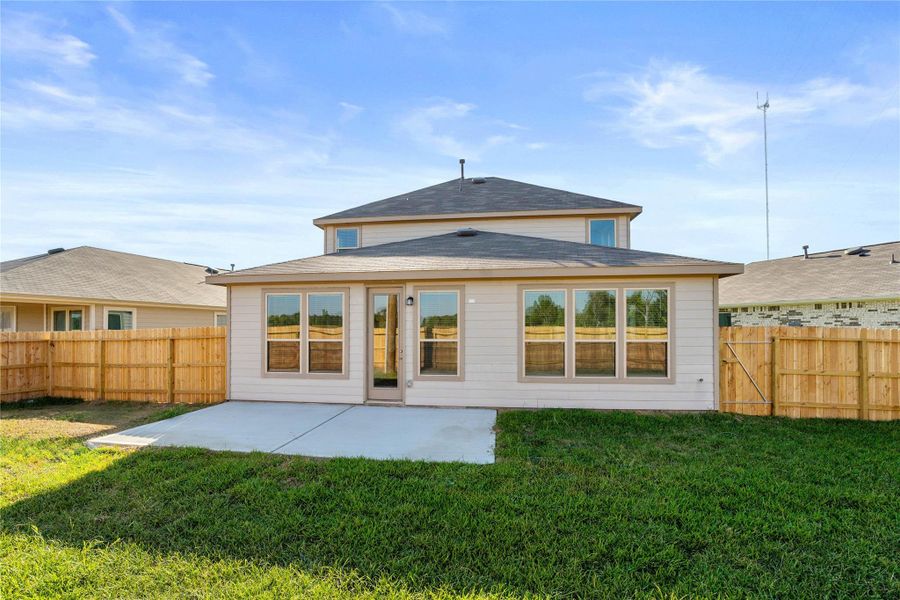 A green and spacious yard for everyone. This large, grassy backyard is a perfect playground for kids and pets, offering plenty of room for activities and relaxation. The backyard space also includes a large patio slab, perfect for your patio furniture and BBQ evenings. Option A green and spacious yard for everyone. This large, grassy backyard is a perfect playground for kids and pets, offering plenty of room for activities and relaxation. The backyard space also includes a large patio slab, perfect for your patio furniture and BBQ evenings. Option