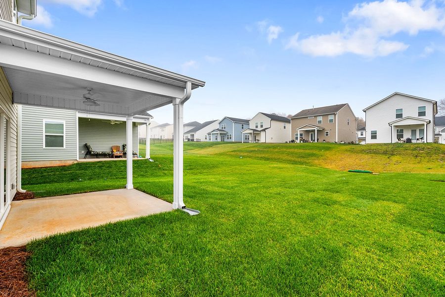 Exterior details and patio area of a home in Hanes Lake, Winston-Salem (Image 4).