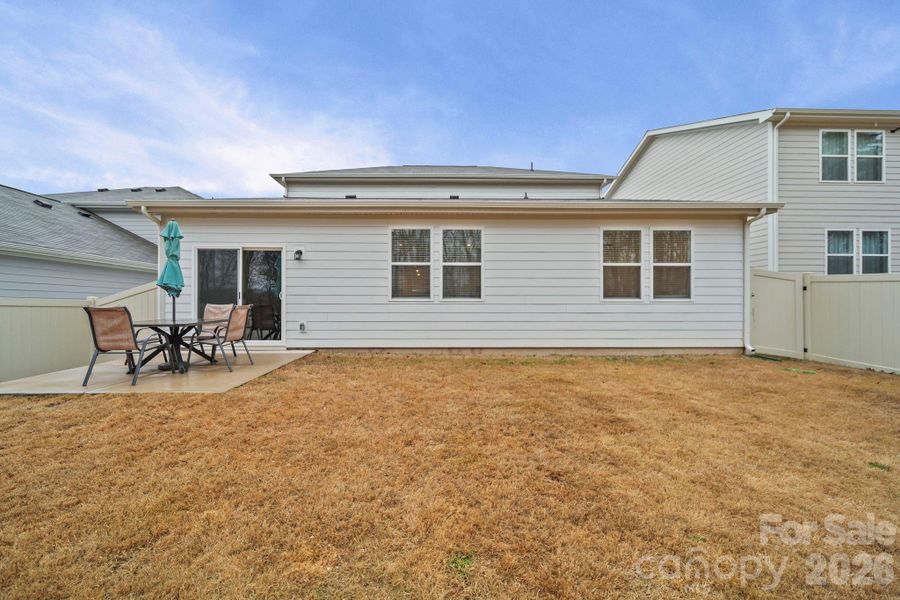 Exterior details and patio area of a home in Blue Sky Meadows, Monroe (Image 28).