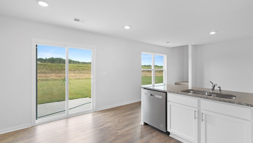 Representative furnished interior of a home built from the BRANDON by D.R. Horton in Harrier Point, Woodruff (Image 7).