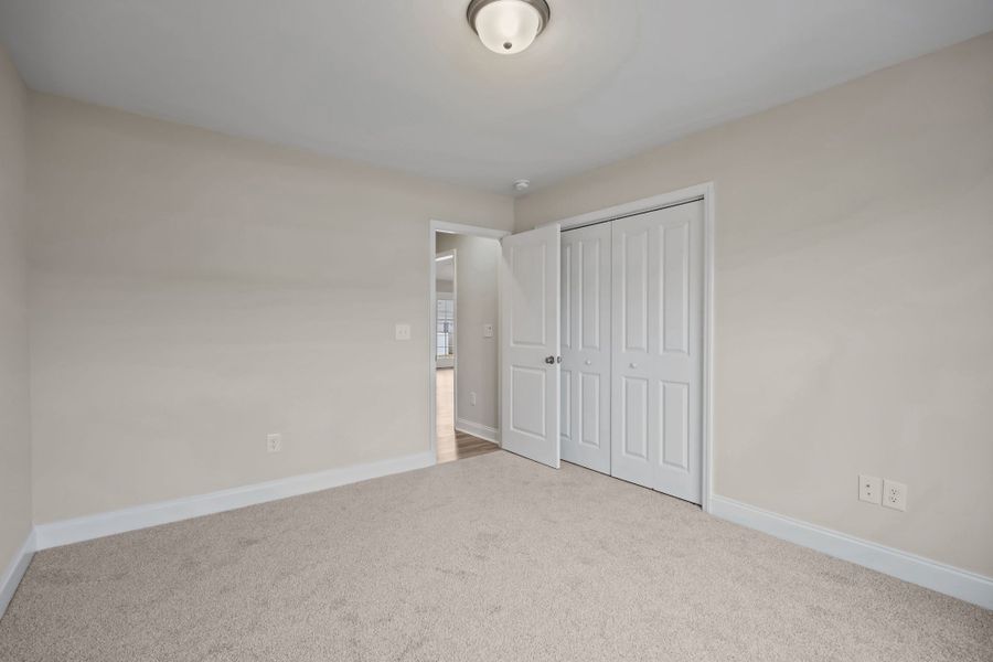 Representative unfurnished interior of a home built from the Hardy by Bill Clark Homes in Laurel Oaks, Greenville (Image 32).