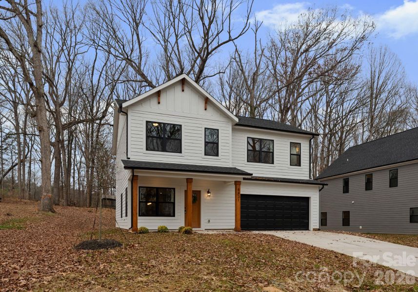 Front exterior of a new home in , Charlotte, NC, highlighting curb appeal (Image 25).