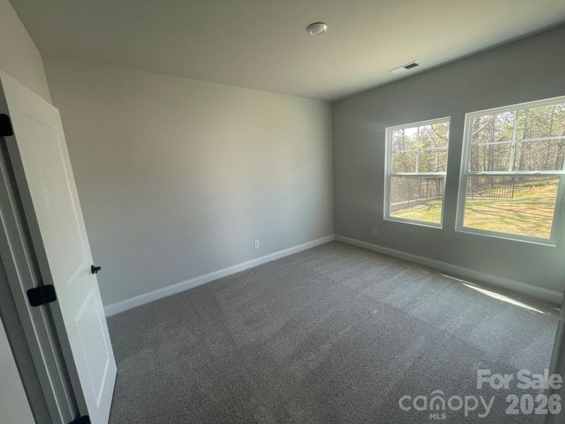 First floor guest suite with walk in closet