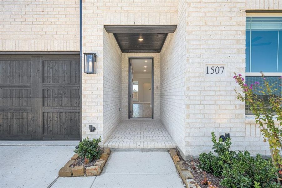 Front exterior of a new home in Devonshire Classic 50-55, Forney, TX, highlighting curb appeal (Image 2). Front exterior of a new home in Devonshire Classic 50-55, Forney, TX, highlighting curb appeal (Image 2).