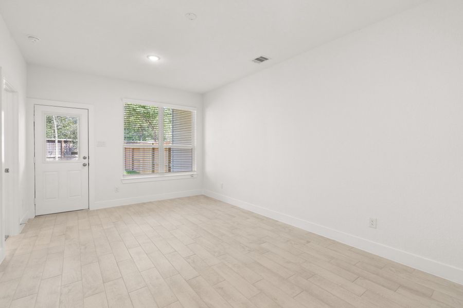 Spacious, unfurnished interior of a new home in Meridiana, Manvel (Image 33).