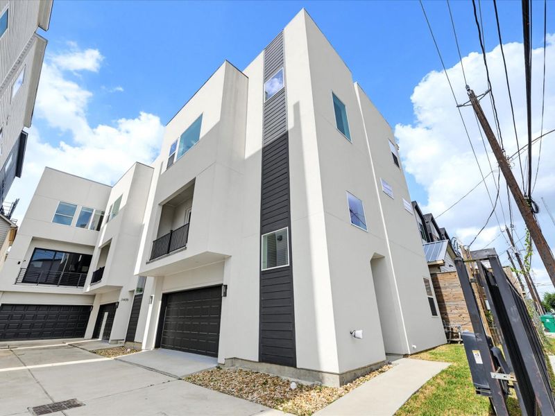 Front exterior of a new home in , Houston, TX, highlighting curb appeal (Image 26).