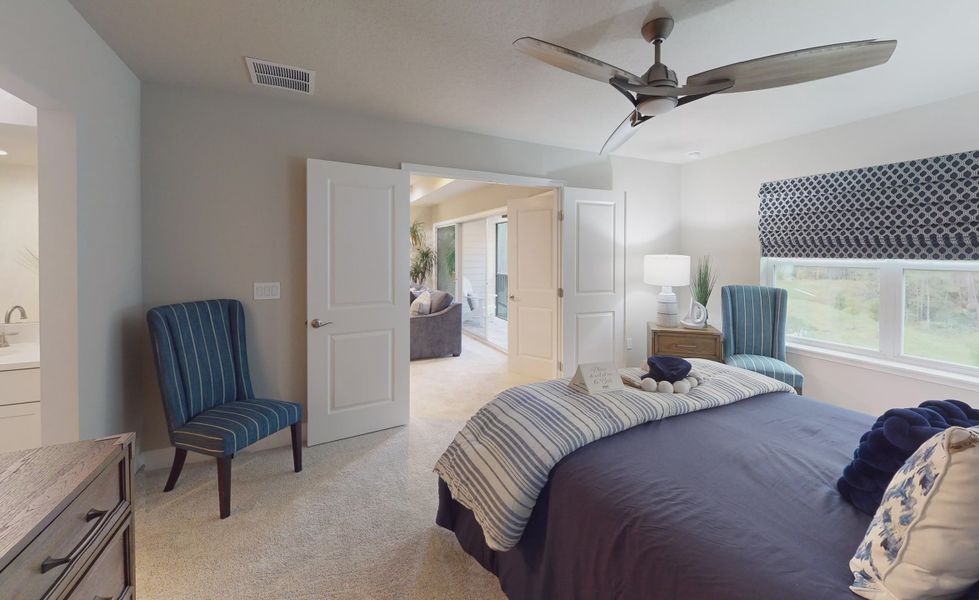 Furnished interior view inside a new home in Plantation Bay, Ormond Beach (Image 32).