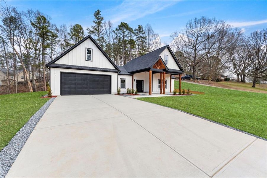 Front exterior of a new home in , Cartersville, GA, highlighting curb appeal (Image 27).
