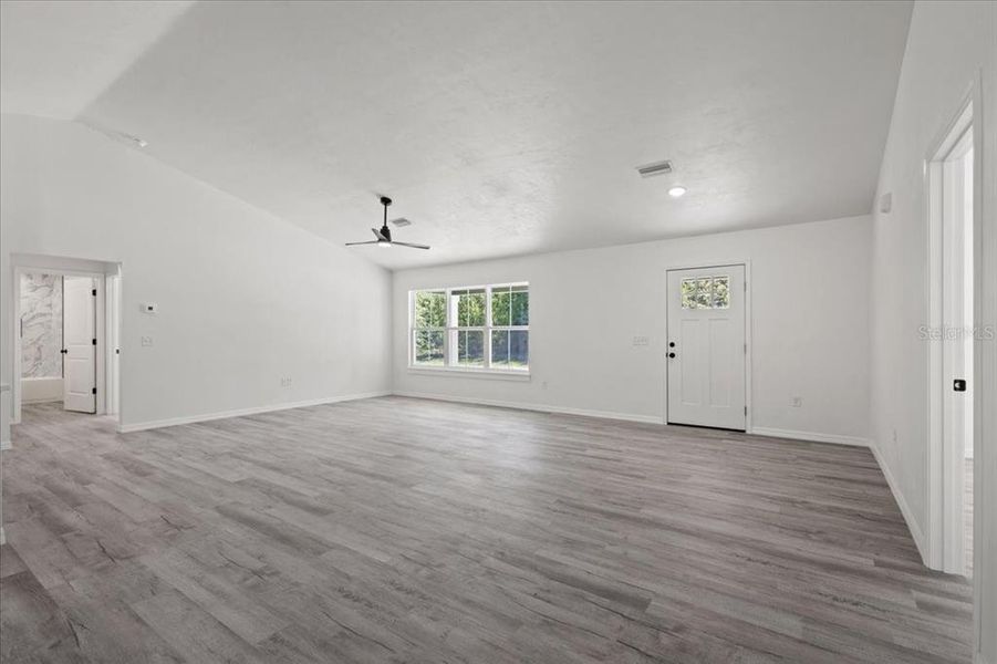 Spacious, unfurnished interior of a new home in , Bell (Image 28).