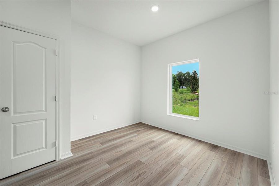 Spacious, unfurnished interior of a new home in Tula Parc, Astatula (Image 14).