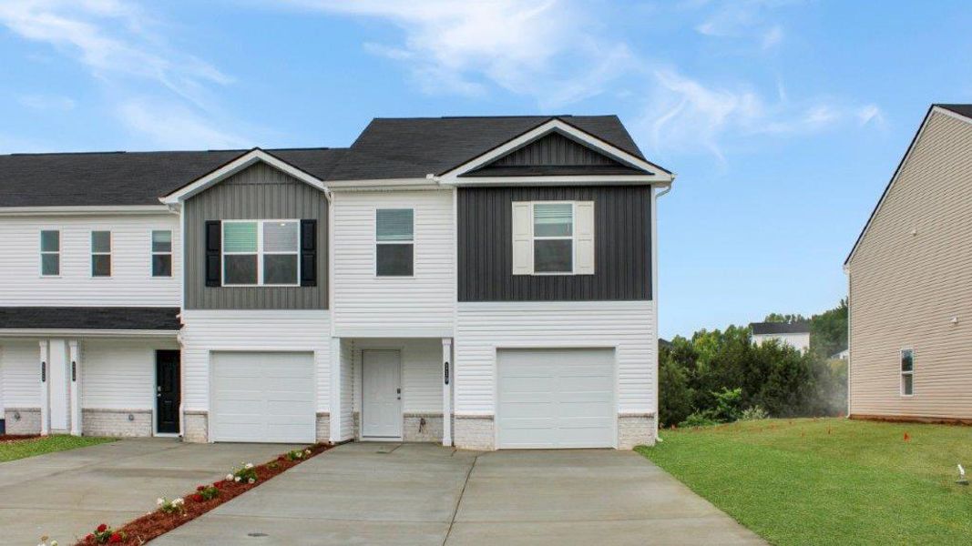 Front exterior of a new home in Owensby Farms Townhomes, Dayton, TN, highlighting curb appeal (Image 1). Front exterior of a new home in Owensby Farms Townhomes, Dayton, TN, highlighting curb appeal (Image 1).