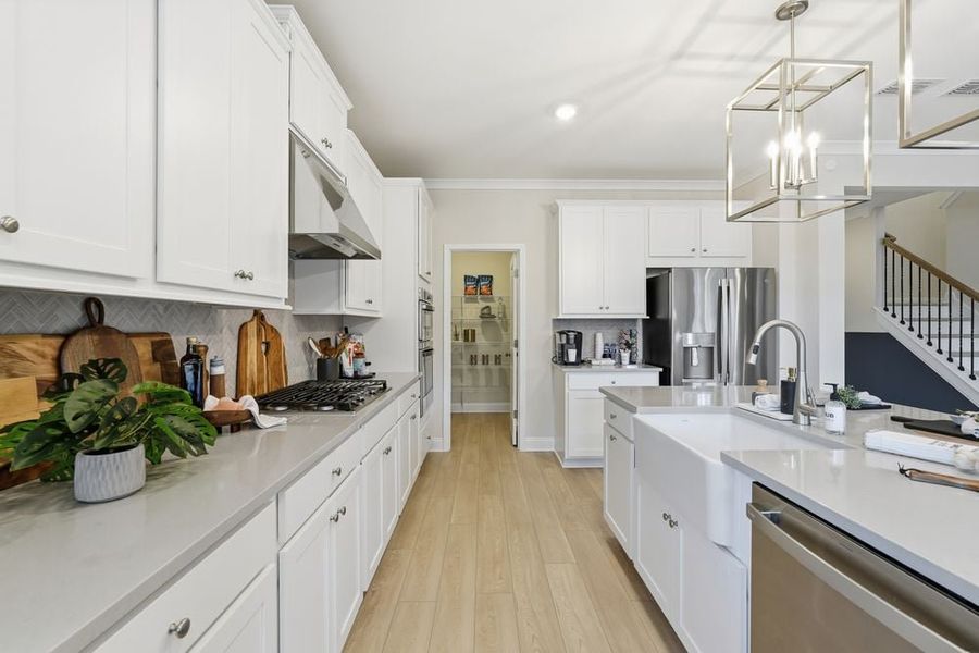 Representative furnished interior of a home built from the Essex by Taylor Morrison in Dreycott, Lawrenceville (Image 28).