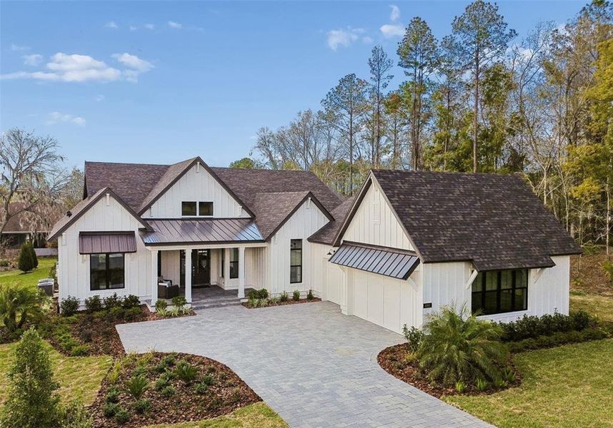 Front exterior of a new home in , Brooksville, FL, highlighting curb appeal (Image 1). Front exterior of a new home in , Brooksville, FL, highlighting curb appeal (Image 1).