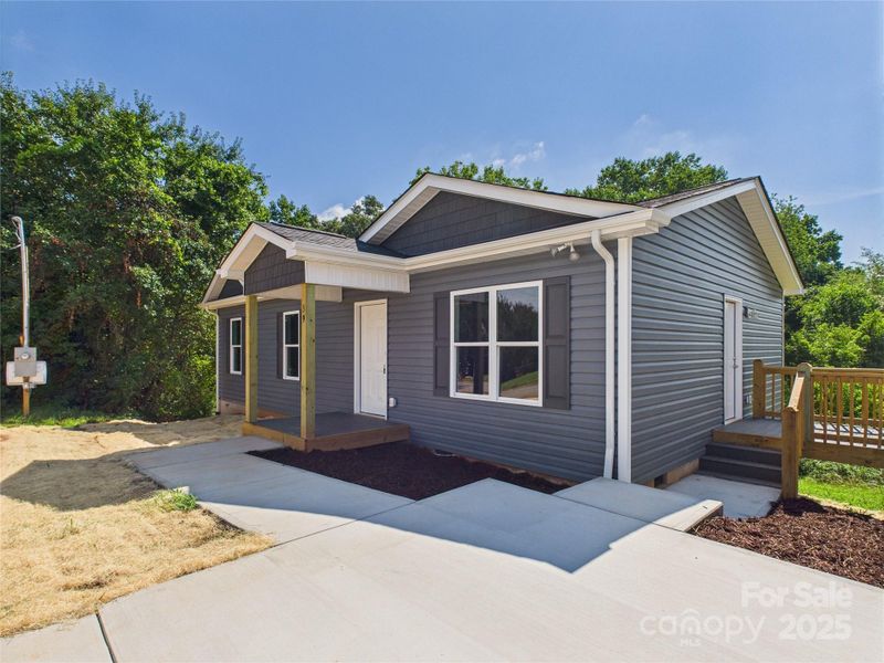 Front exterior of a new home in , Granite Falls, NC, highlighting curb appeal (Image 2).