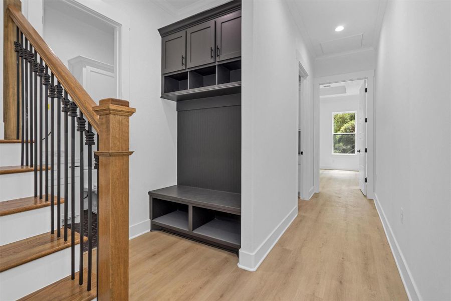 Mud room cabinet at garage entry for ample storage.