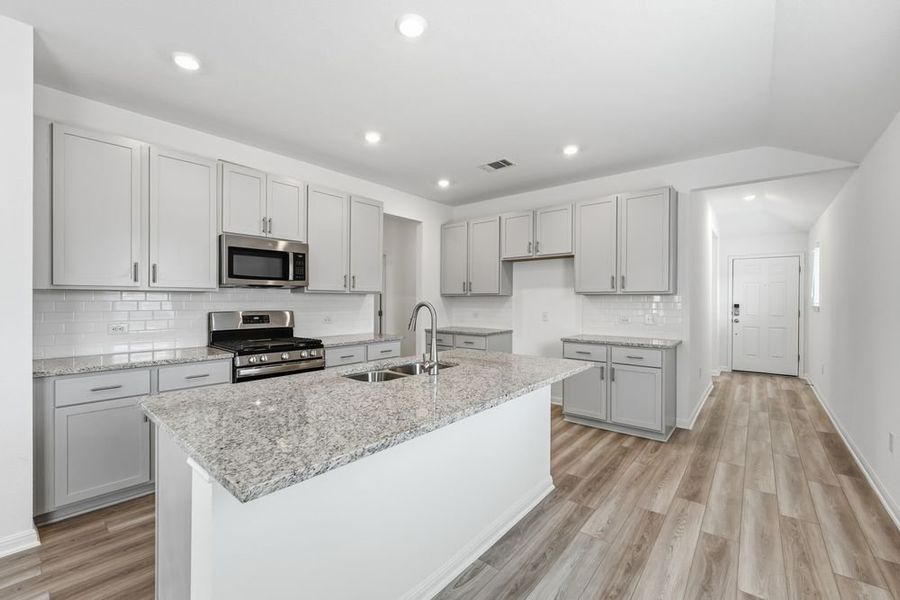 Furnished interior view inside a new home in Longview, Del Valle (Image 4).