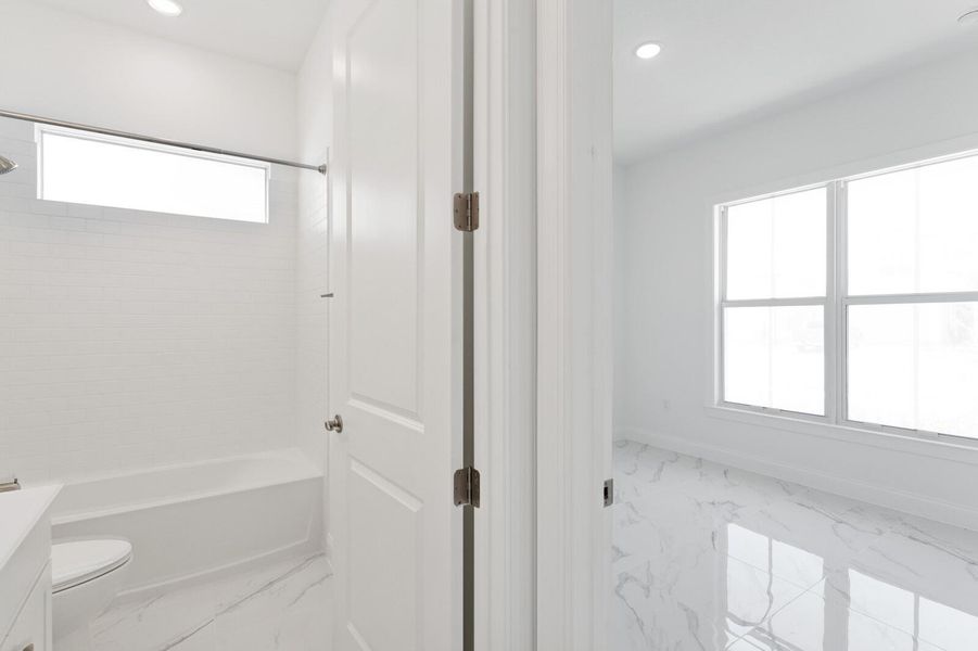 Furnished interior view inside a new home in Salerno Reserve - Single Family, Stuart (Image 17). Furnished interior view inside a new home in Salerno Reserve - Single Family, Stuart (Image 17).