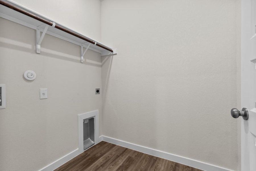 A white wall with a white door. A white wall with a white door.