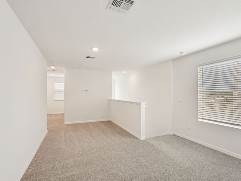 Spacious, unfurnished interior of a new home in Coasterra - Premier Series, Palmetto (Image 10).