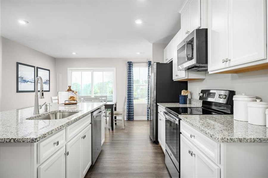 Representative furnished interior of a home built from the Aruba Bay by Ryan Homes in Carolina Crofts, Greenville (Image 2).