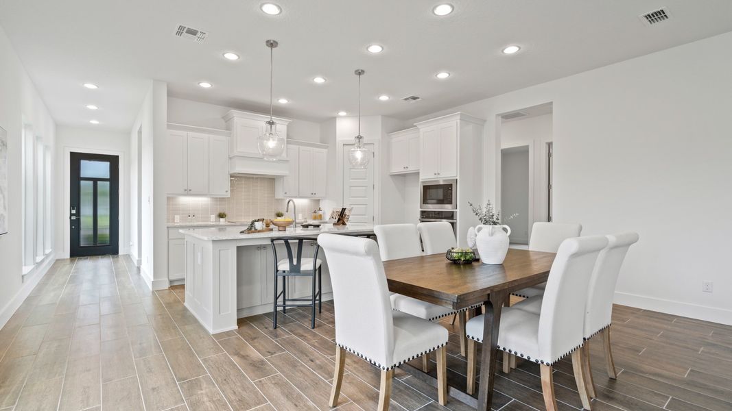 Representative furnished interior of a home built from the 2262F by Perry Homes in Star Farms at Lakewood Ranch, Bradenton (Image 5).