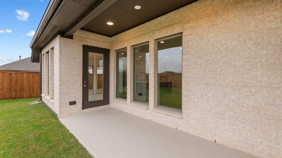 Exterior details and patio area of a home in Myrtle Creek 60', Waxahachie (Image 2).