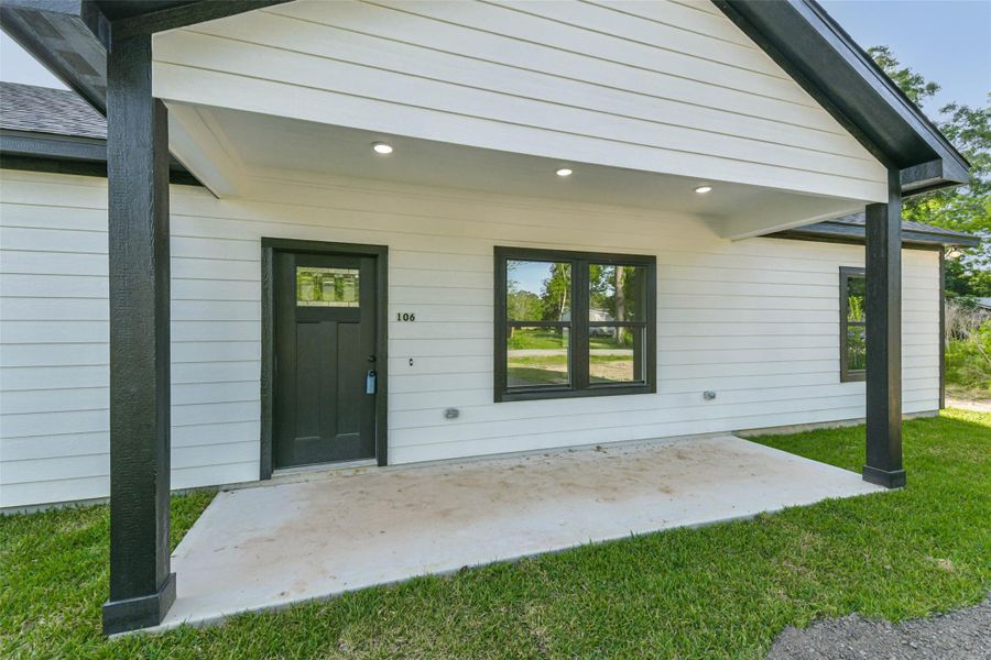 Front exterior of a new home in , Splendora, TX, highlighting curb appeal (Image 18). Front exterior of a new home in , Splendora, TX, highlighting curb appeal (Image 18).