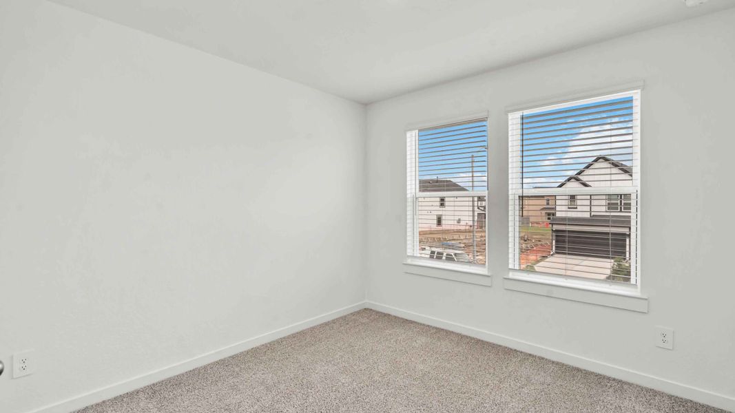 Representative unfurnished interior of a home built from the Hibiscus by D.R. Horton in City Gate North, Houston (Image 12).
