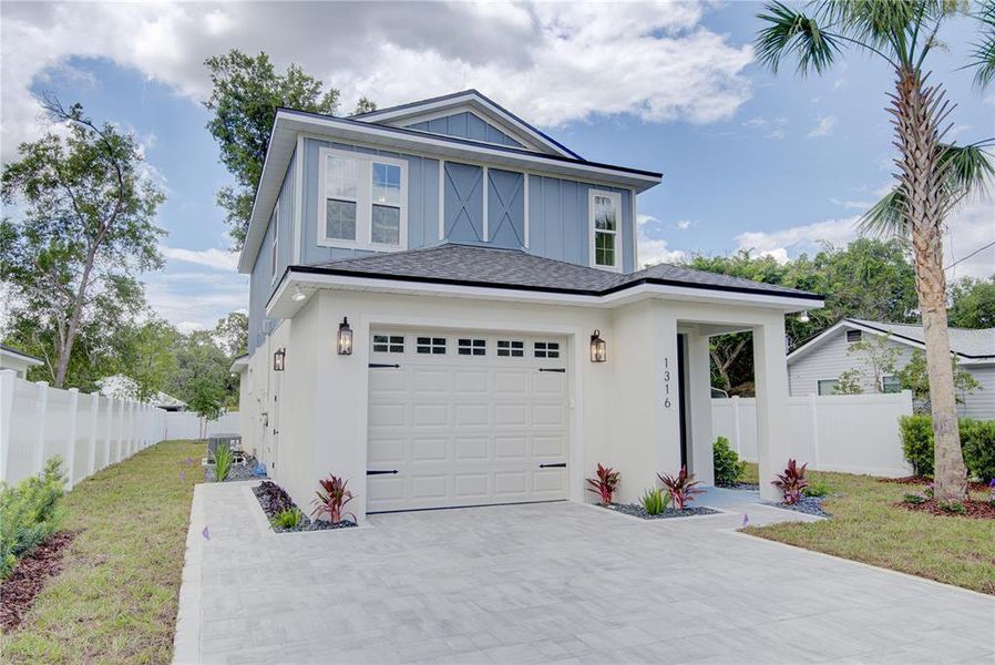 Front exterior of a new home in , Mount Dora, FL, highlighting curb appeal (Image 2). Front exterior of a new home in , Mount Dora, FL, highlighting curb appeal (Image 2).