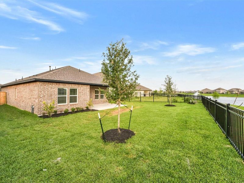 Exterior details and patio area of a home in Sunterra, Katy (Image 3).